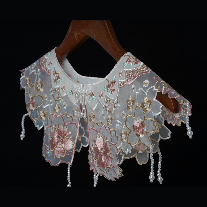 Flor feminina envolve bordado  - Vintage Fashion Photographers avaliação e preço